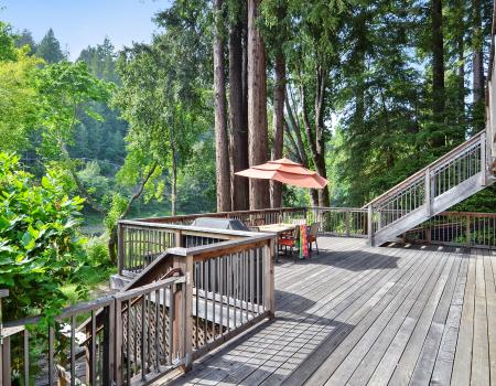Boathouse deck overlooking back yard and the Russian River Boathouse river view deck